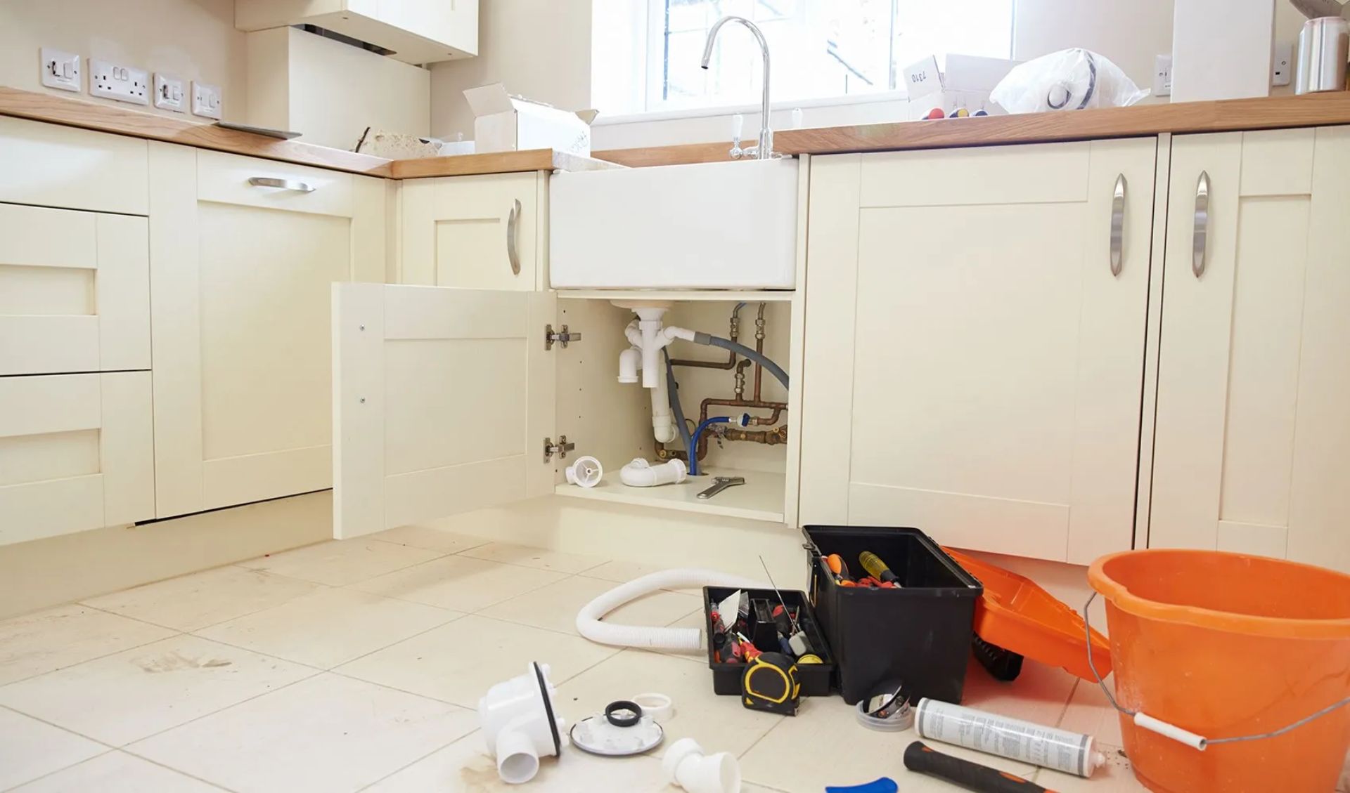 Plumbing and HVAC service work in a residential home